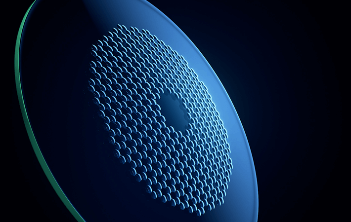 A close up of the MyoPro lens features hexagons on the front to help reduce myopia progression in children